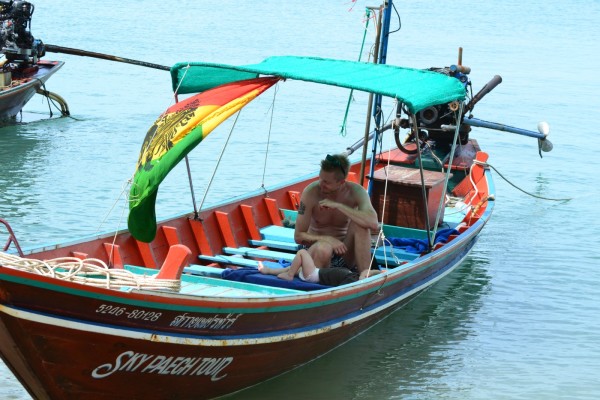 Quick nap on the snorkeling trip around Koh Phangan