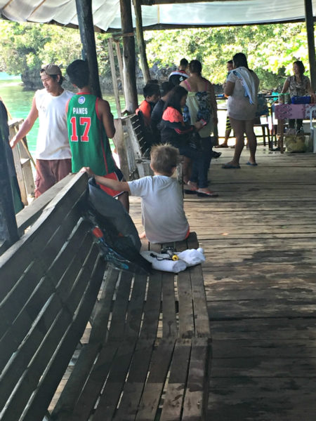 Waiting for a small boat to take us into the Lagoon