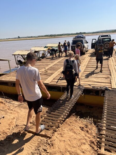 Loading our jeep on the raft