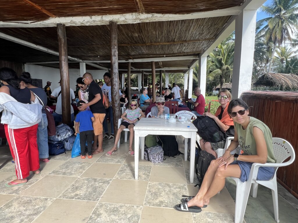 Hiding from an early sun at Mahambo to Saint Marie Island  ferry pier